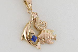 A Sea lives Pendant of A Dolphin, Seahorse, and Angel Fish Handcrafted by Phuong Nguyen